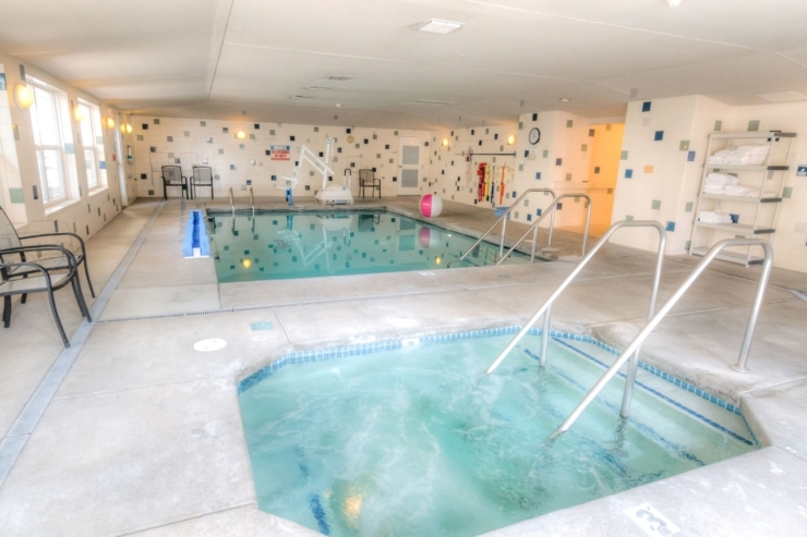 An inviting indoor pool area, perfect for relaxation and community gatherings. Enjoy tranquility here.