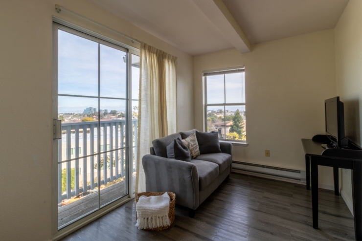 Bright and inviting, this serene living space offers views, comfort, and a sense of community.