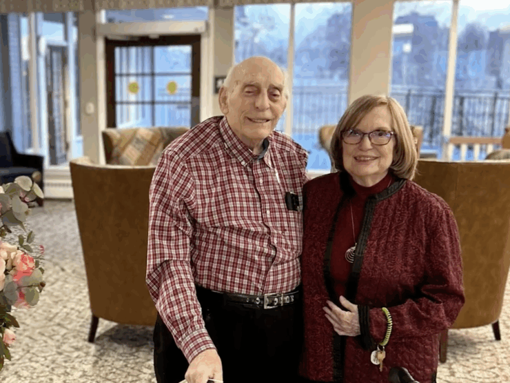 Warm smiles and gentle companionship fill the welcoming community space, fostering connection.