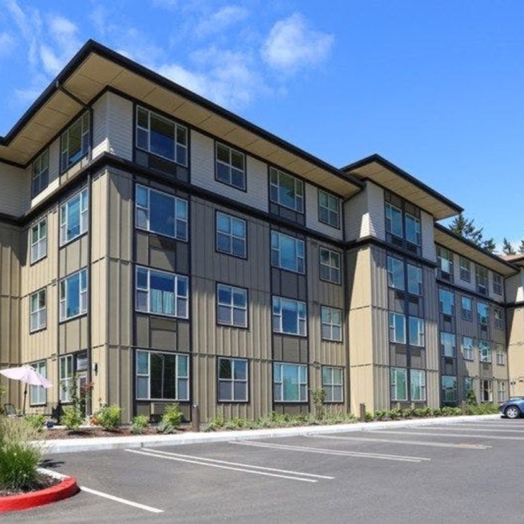 A welcoming retirement community, featuring modern architecture and bright, inviting spaces.