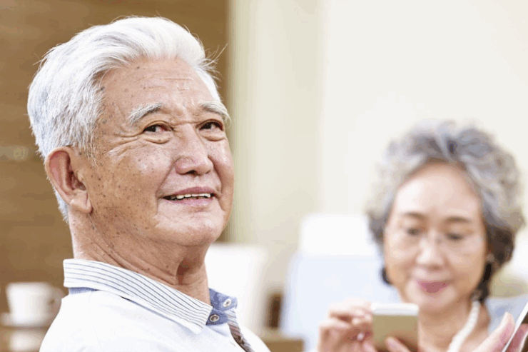 A warm and inviting atmosphere, showcasing joyful seniors engaging in conversation and connection.