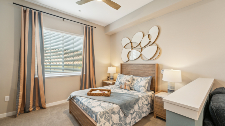 Bright and inviting, this cozy bedroom offers comfort and warmth, perfect for community living.