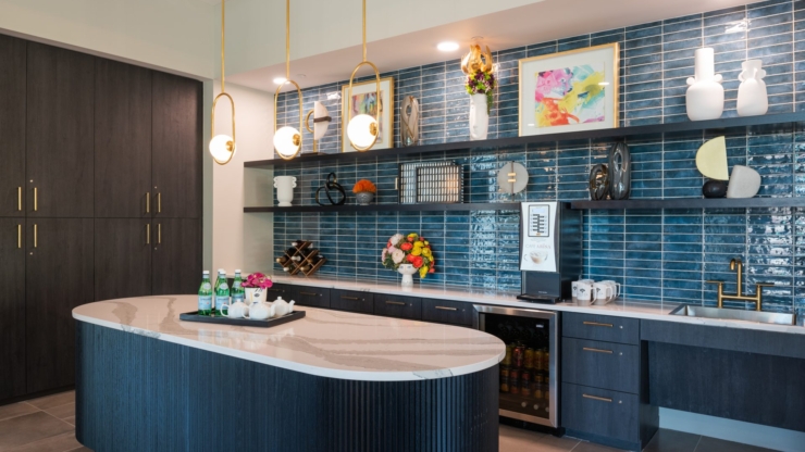 A stylish communal kitchen featuring elegant décor, inviting spaces, and a warm, welcoming atmosphere.
