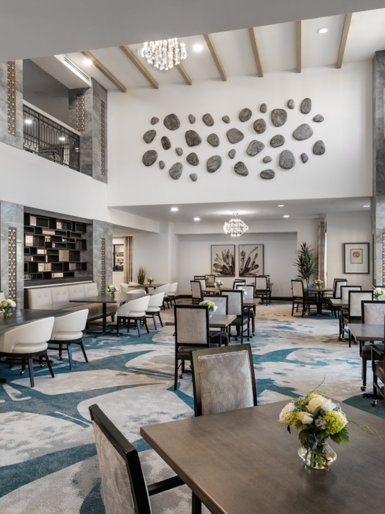 Bright and open dining area inviting residents to gather, share meals, and enjoy community moments.