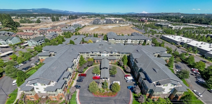 A welcoming retirement community surrounded by beautiful landscapes, promoting comfort and connection.