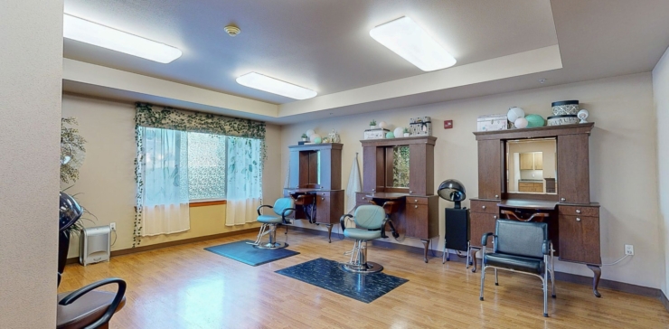 Bright and inviting salon space, perfect for community connections and relaxation.