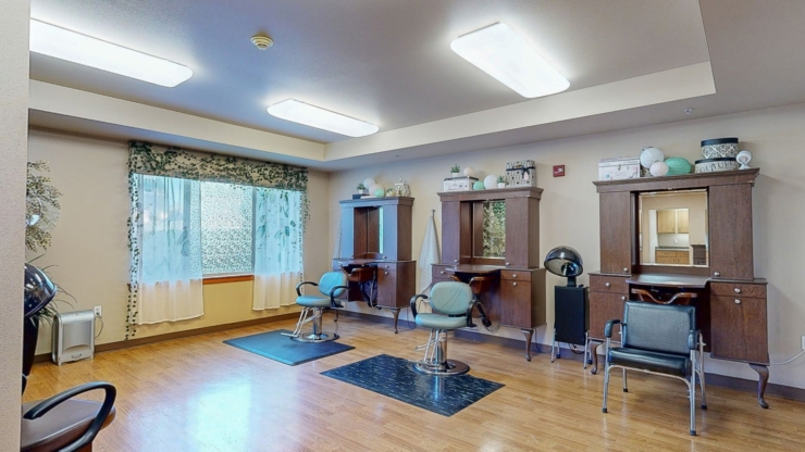 Bright and inviting salon space, perfect for community connections and relaxation.