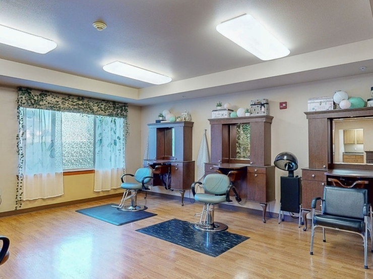 Bright and inviting salon space, perfect for community connections and relaxation.