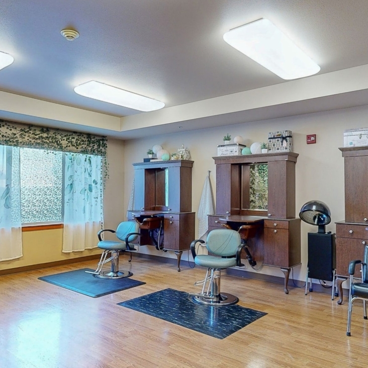 Bright and inviting salon space, perfect for community connections and relaxation.