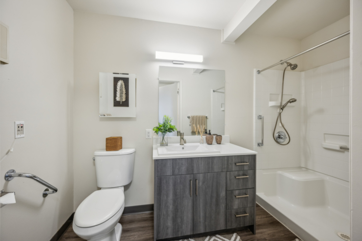 A bright, welcoming bathroom featuring modern fixtures and thoughtful details for comfort and ease.