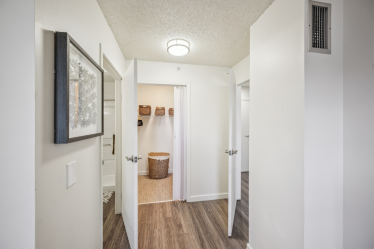 A bright, welcoming hallway leads to spacious, organized rooms, promoting comfort and community.