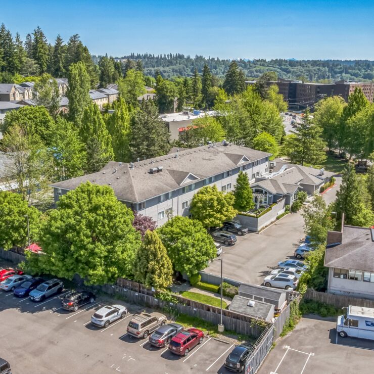 A vibrant community surrounded by lush greenery, inviting comfort and connection for all residents.