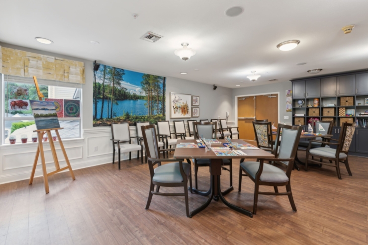 Bright and inviting space encourages creativity and connection, featuring art supplies and scenic decor.