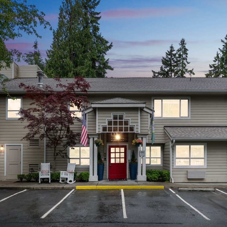 Welcoming entrance surrounded by greenery, inviting residents to enjoy a vibrant community atmosphere.