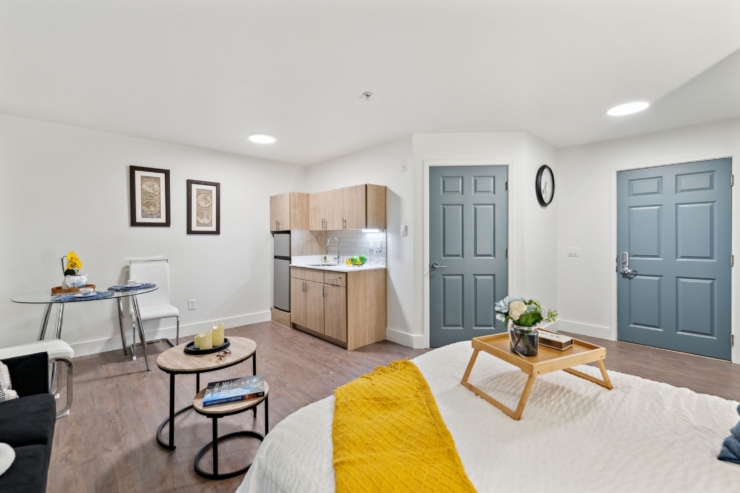 Bright and inviting space with cozy furnishings, perfect for community living and personal comfort.