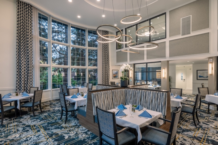 Bright and inviting dining area, featuring elegant decor and a warm atmosphere for community gatherings.