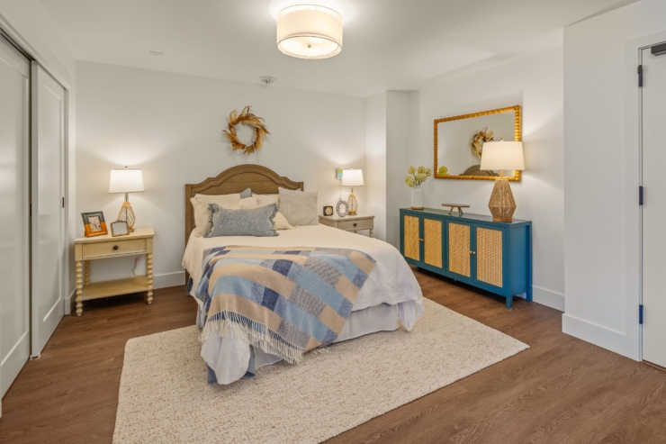 Bright and inviting, this beautifully styled room emphasizes comfort and community with cozy furnishings.