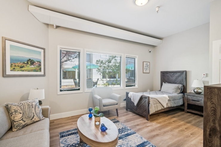 A cozy indoor garden space inviting connection and nurturing, perfect for community activities.