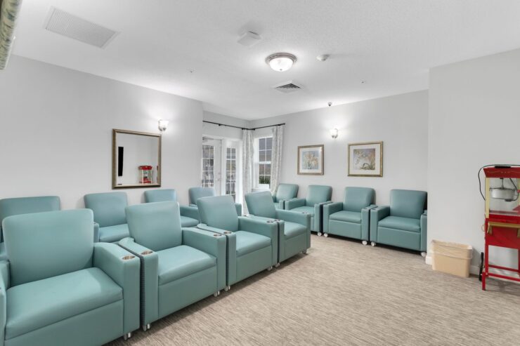 Bright, inviting lounge with comfortable seating, perfect for community gatherings and relaxation.