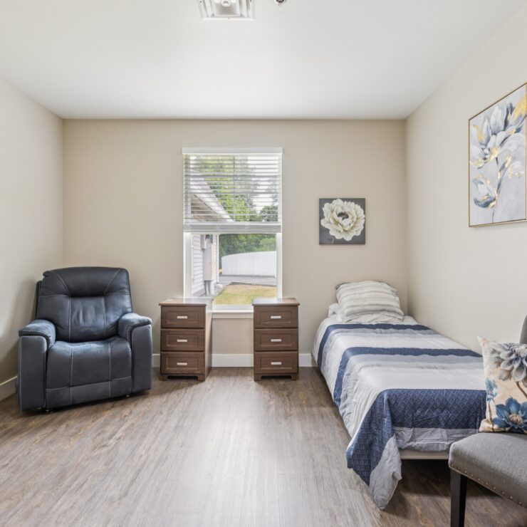 Bright and inviting, this room features comfortable seating and personal touches, fostering a warm community feel.