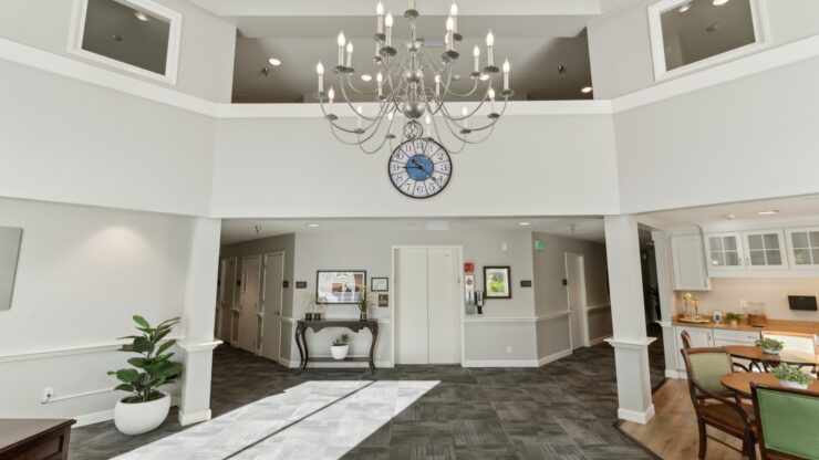 Bright and inviting, the welcoming common area features elegant decor and ample space for community gatherings.