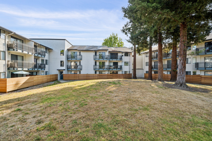 A welcoming community with spacious grounds and inviting, well-lit residences for comfortable living.