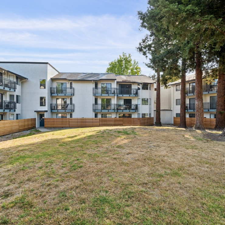 A welcoming community with spacious grounds and inviting, well-lit residences for comfortable living.