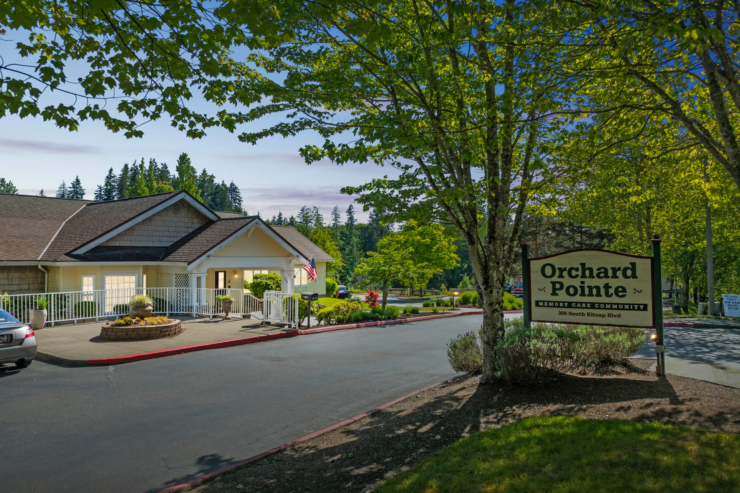 A welcoming community surrounded by lush greenery, offering warmth and comfort for residents.