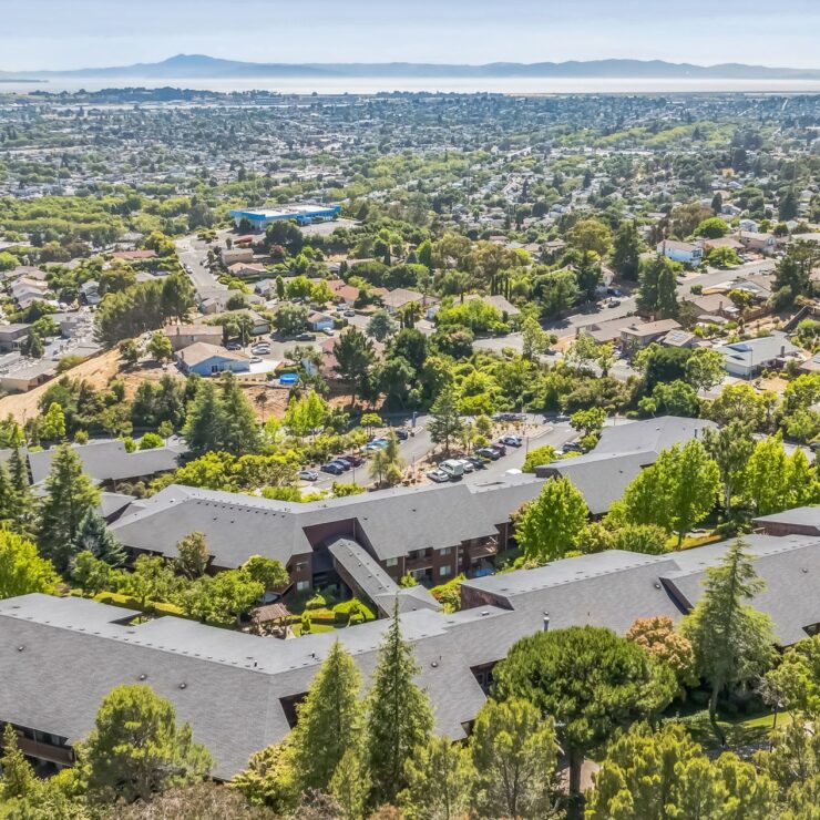 A serene community nestled among lush greenery, offering a welcoming atmosphere and beautiful views.