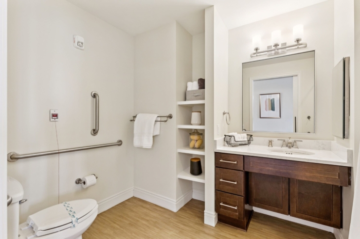 A bright, welcoming bathroom offering comfort and safety, enhancing a sense of community.