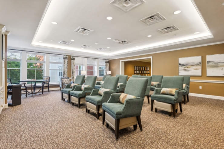 A welcoming community space featuring comfortable seating and ample natural light, perfect for gatherings.