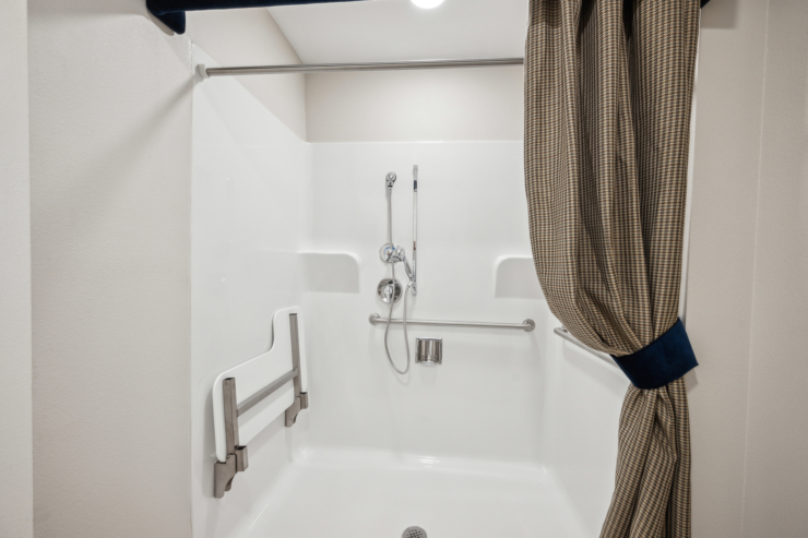 An inviting, accessible shower space designed for comfort and safety, enhancing daily routines.