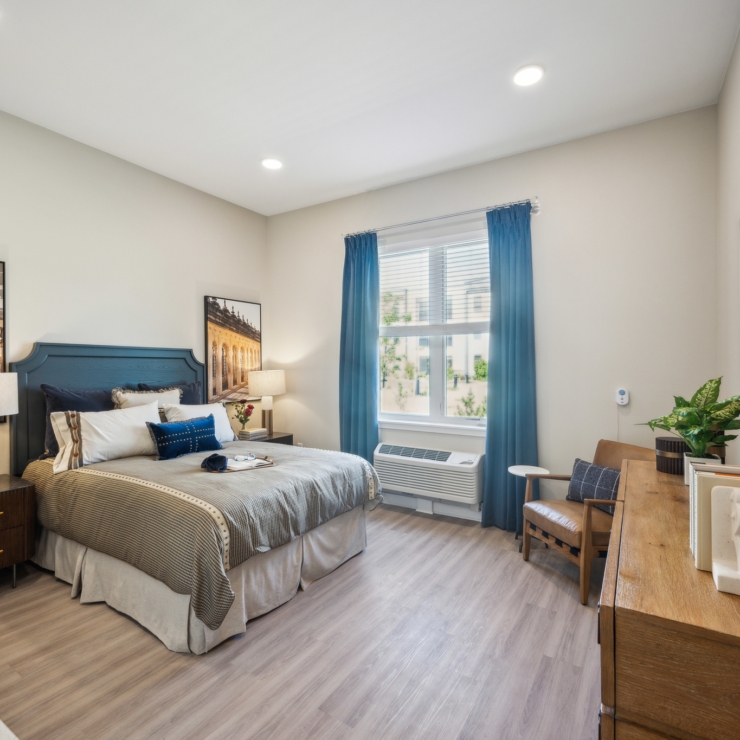 A cozy, inviting room filled with natural light, offering comfort and a sense of community.