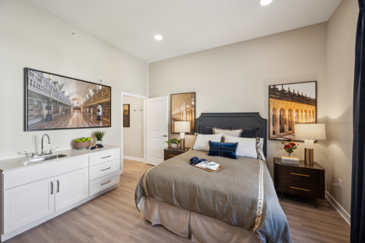 A warm, inviting space featuring a comfortable bedroom, modern amenities, and thoughtful decor, fostering community.