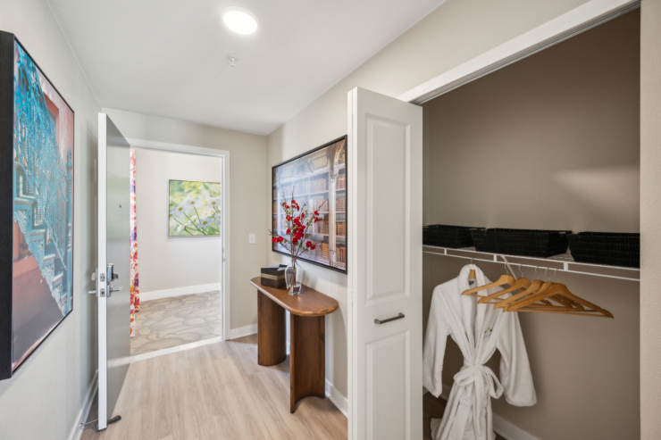 A welcoming entrance featuring soft textures and soothing colors, ideal for a vibrant community.