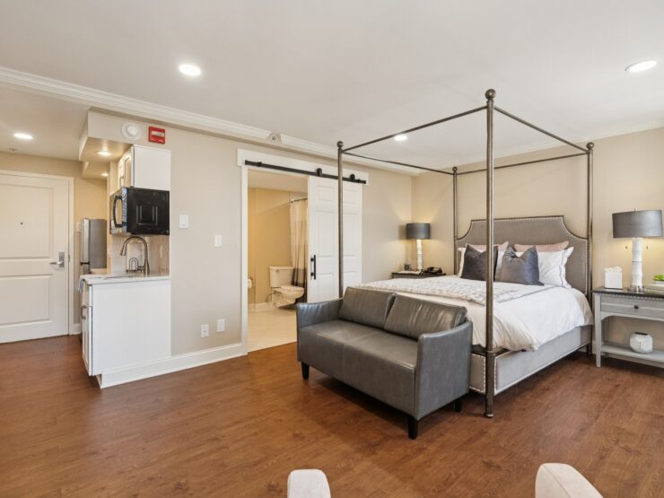 Bright, inviting room featuring a spacious layout, elegant furnishings, and a warm atmosphere for community living.