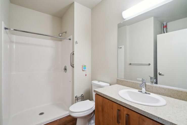 A bright, accessible bathroom designed for comfort, featuring modern fixtures and ample space.
