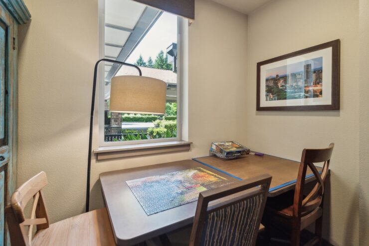 A welcoming space with a puzzle on the table, inviting relaxation and connection among residents.