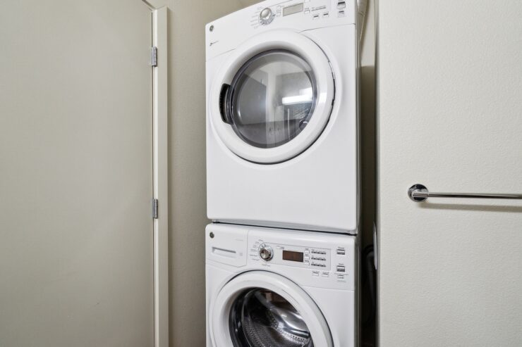 A bright laundry area featuring modern appliances, promoting convenience and a sense of home.