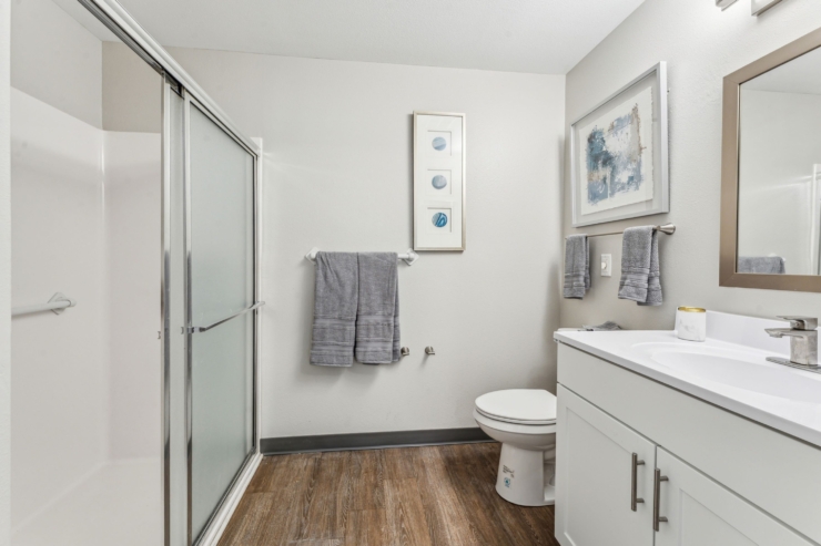 Warm and inviting, this serene bathroom offers a comforting space with modern amenities and thoughtful details.