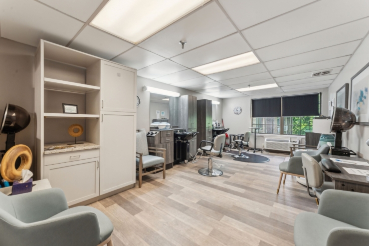 Delightful salon space fostering community, comfort, and relaxation among residents.
