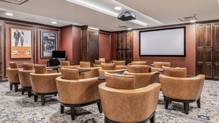 A welcoming theater space with comfortable seating, perfect for community gatherings and movie nights.