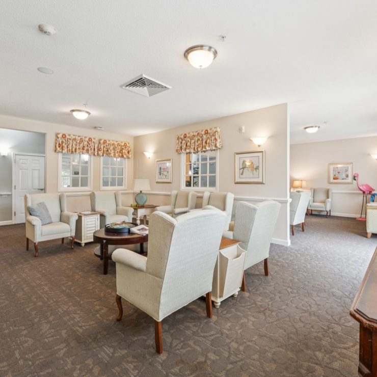 A welcoming lounge filled with comfortable seating, perfect for community gatherings and relaxation.