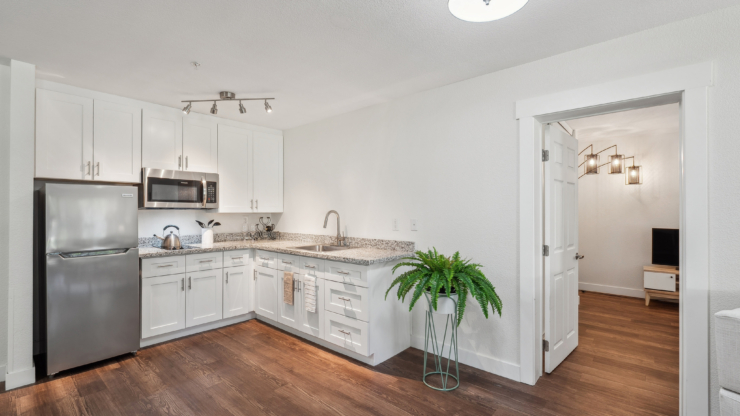 Inviting kitchen space with modern amenities, fostering a sense of community and comfort.