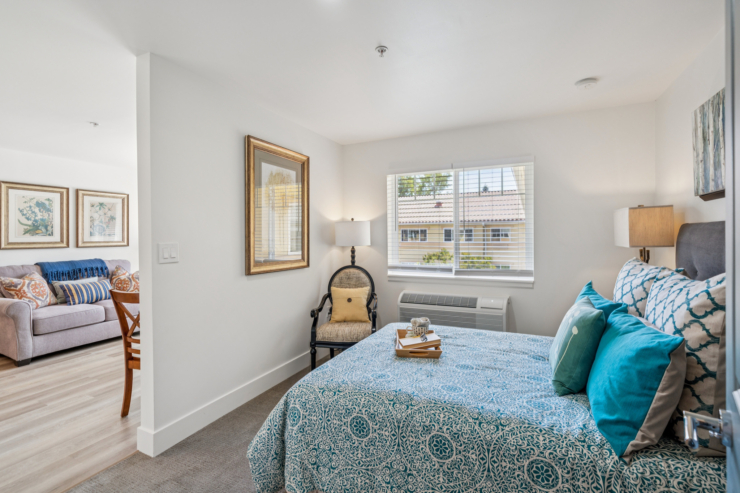 Warm, inviting space featuring comfortable furnishings, bright natural light, and a sense of community.