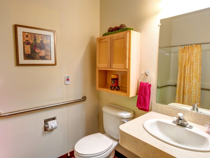 Bright and inviting, this bathroom blends comfort with thoughtful design, perfect for relaxation.