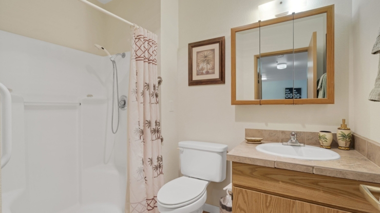 Bright and welcoming, this bathroom exudes warmth, comfort, and thoughtful design for residents.