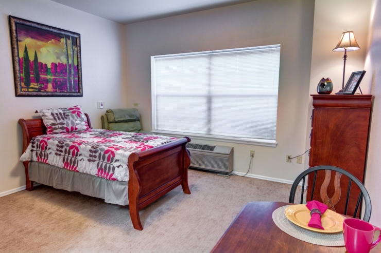Bright and inviting, this room features cozy furnishings and personal touches for a welcoming atmosphere.
