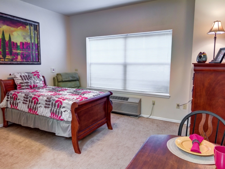 Bright and inviting, this room features cozy furnishings and personal touches for a welcoming atmosphere.