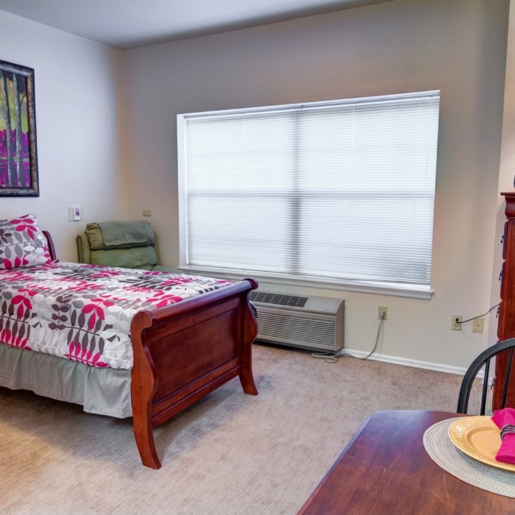 Bright and inviting, this room features cozy furnishings and personal touches for a welcoming atmosphere.